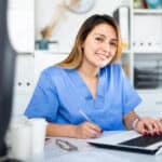 Miami medical assistant program student working in doctor's office