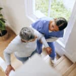 A miramar nursing assistant home health aide school graduate working as in home care health aide - assisting a client in their home