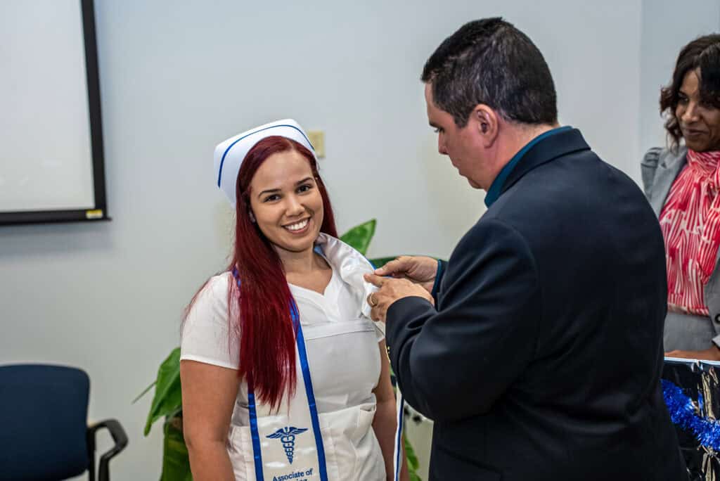 Miramar ASN nursing degree program graduate getting pinned